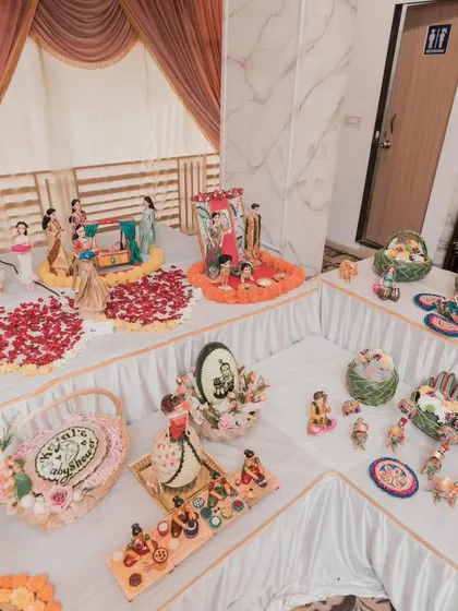 Another perspective of the grand baby shower setup for Kajal, highlighting the L-shaped arrangement and the sheer variety of scenes and food items.