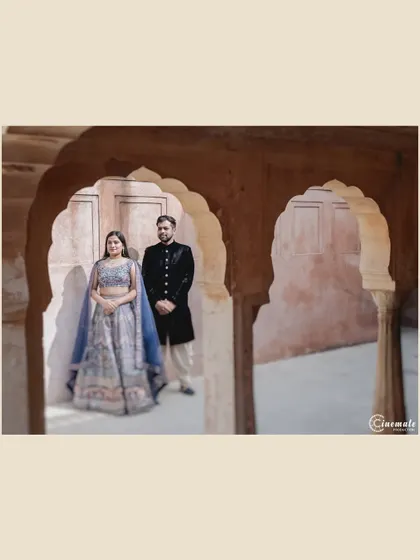 Using the beautiful archways of a Rajasthani fort to create a natural frame for the couple. This composition adds depth and a sense of place to this elegant pre-wedding portrait.
