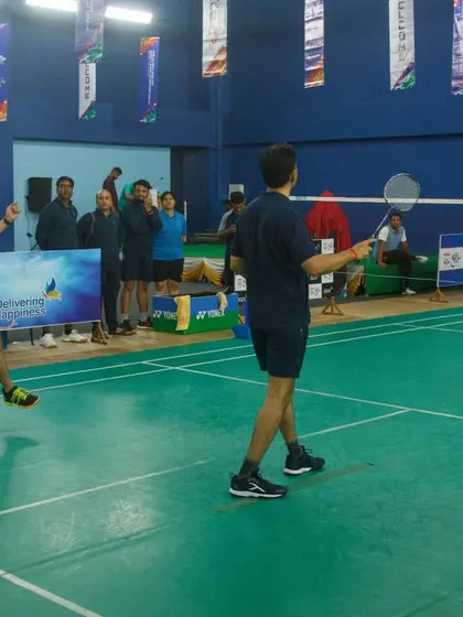 A dynamic jump smash during a corporate tournament match. We bring the same level of energy and professionalism to our corporate events as we do to our national ranking tournaments.