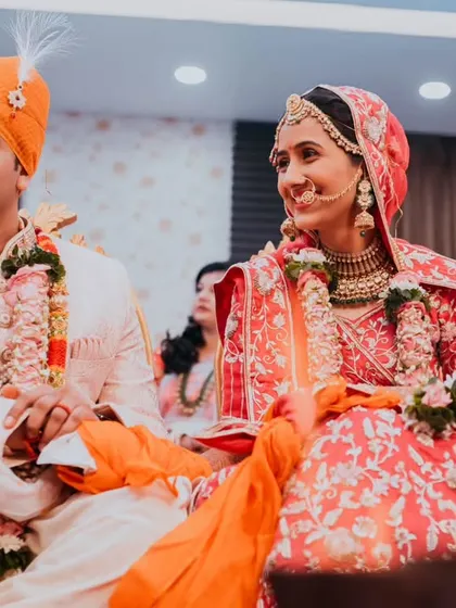A quiet, shared glance between the bride and groom during their ceremony. These are the subtle, intimate moments we seek to capture, telling a story of love and partnership.