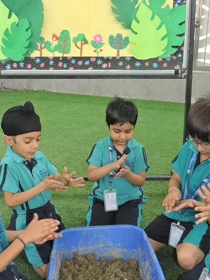 Teamwork and hands-on learning are at the heart of our 'Seed Week' activities, as students collaborate to make seed balls.
