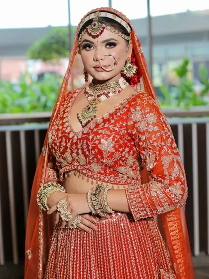 A closer look at the bride's radiant makeup. The soft smokey eye and nude-pink lip create a balanced and elegant look.