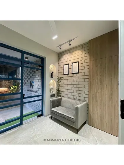 A look into our studio from the entrance, showing the waiting area and the view into the main office space.
