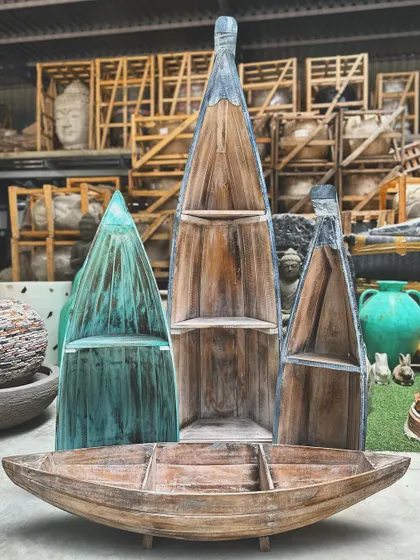 For decor that's both functional and full of personality. Our reclaimed wooden boat shelves are a quirky, nautical-inspired way to display your favorite books and treasures, adding a touch of coastal charm to any room.