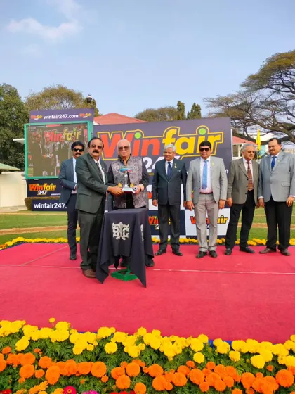 The 161st Year Commemoration Trophy is presented to the winning connections.
