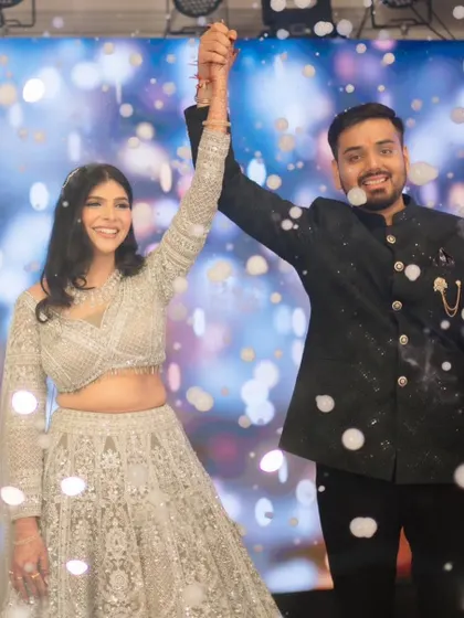 A happy shot of the couple on stage.
