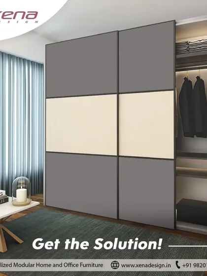 The solution to clutter is a well-designed modular wardrobe. This sliding door wardrobe with a clean, two-tone finish offers ample, organized space, turning chaos into calm.