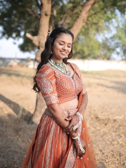 Another angle of this beautiful engagement look, showing how the soft makeup and hairstyle come together to create a cohesive and elegant appearance.
