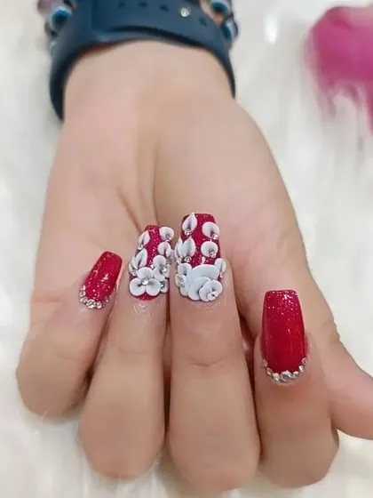 Another angle showcasing the stunning 3D floral work. This design is perfect for clients who want their nails to be a true work of art.
