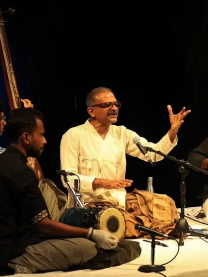 A close-up of T.M. Krishna in concert.