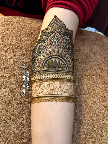 The outline stage of the jhumki armband. I stress the importance of planning the design and getting the proportions right before filling.