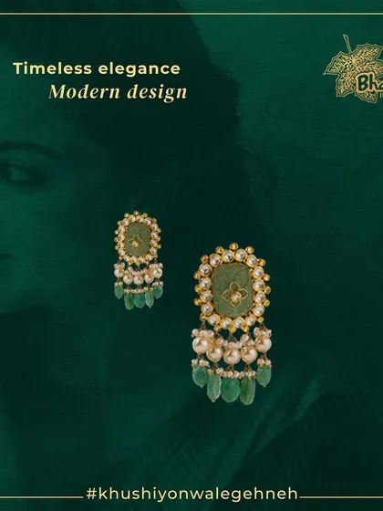 Add a touch of elegance to your outfit with our pearl-studded earrings. They are crafted with green Meenakari work, Kundan settings, and delicate diamonds, offering a look of timeless elegance and modern design.