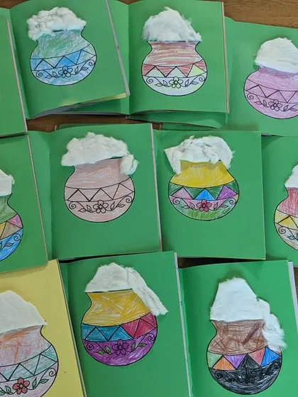 For the harvest festival, the children created these beautiful art pieces depicting a traditional Pongal pot, using cotton to show the milk boiling over.