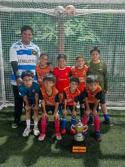 The U11 team celebrating their runner-up finish at the Andheri Champions League.
