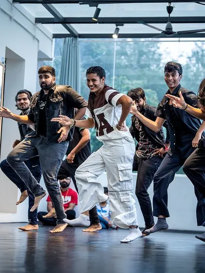 Another angle of the group performance, showing the energy from a different perspective.