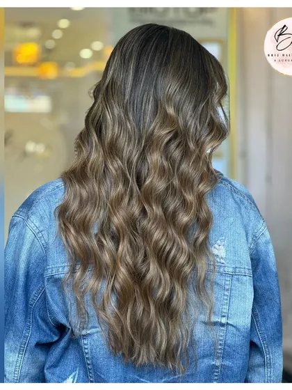 The full effect of this elegant neutral brown hair. The color is sophisticated and the style is timeless.