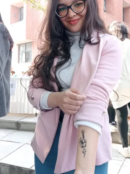 A client showing off her Thor's hammer (Mjolnir) temporary tattoo on her forearm. I love creating designs from pop culture.