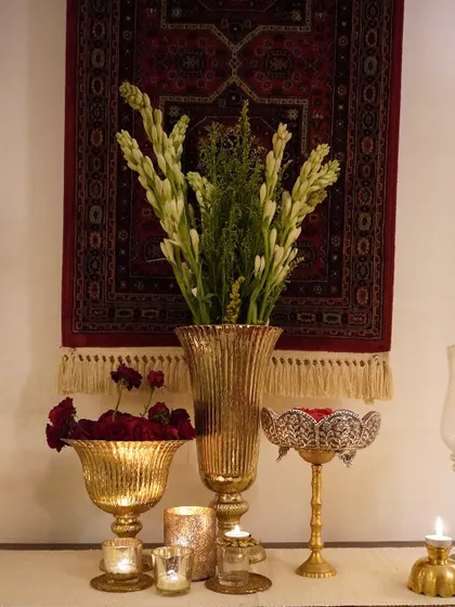 A beautiful arrangement of fresh flowers and brass urlis on my console table. This is a classic and timeless way to decorate for any festival.