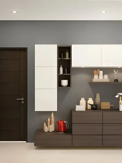 This modular storage unit in dark wood and white is perfect for a modern dining area. The combination of open shelves and closed cabinets allows for both display and hidden storage.