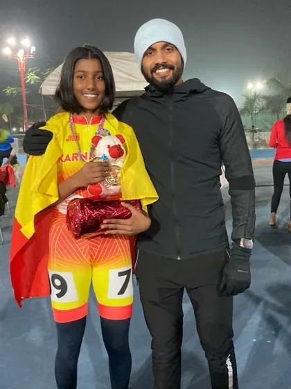 Celebrating a student's victory at the 59th National Championship. Her dedication during our inline skate power workouts paid off.