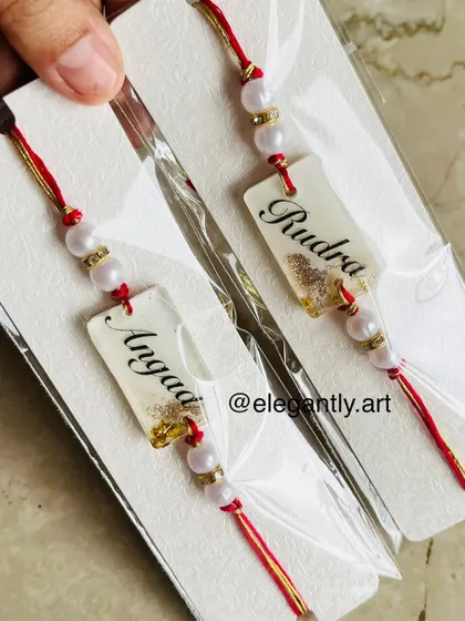 Custom resin Rakhis with names, perfect for celebrating the bond of sibling love.