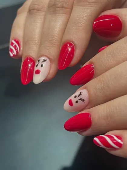 Another view of the adorable Christmas-themed nail art. Perfect for the holiday season.