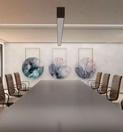 A sleek and modern conference room designed for a next-generation entrepreneur. The long table, ergonomic chairs, and abstract art create a professional and forward-thinking environment.