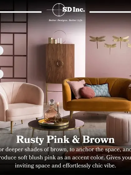 This image showcases a chic and inviting space using a rusty pink and brown color palette. The soft blush tones in the armchair and ottoman are anchored by the deeper brown of the loveseat and cabinet.