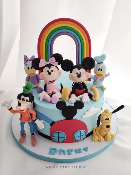 A beautiful Disney playhouse cake. This non-fondant cake requires a minimum of 4 kgs and features all the classic characters, handcrafted and ready to play.