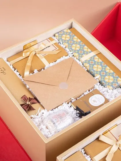 The stunning red and gold butterfly boxes we created for Dream11. This is a perfect example of a high-end, bespoke gifting solution for VIP clients.