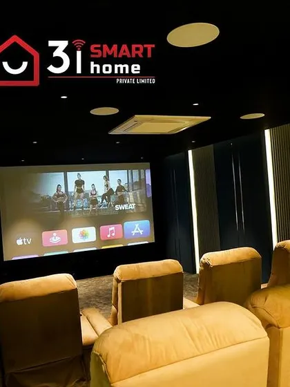 This shot captures the immersive experience of watching a movie in this custom-built theater, with the screen and sound system working in perfect harmony.