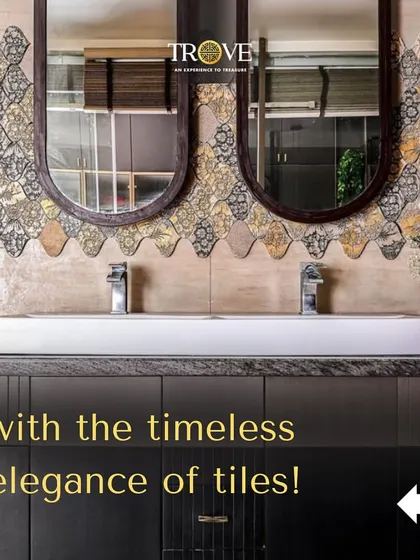 Create a luxurious bathroom vanity with a statement backsplash. These ornate, fan-shaped tiles in gold and black add a touch of art deco glamour, transforming a functional area into a stunning focal point.