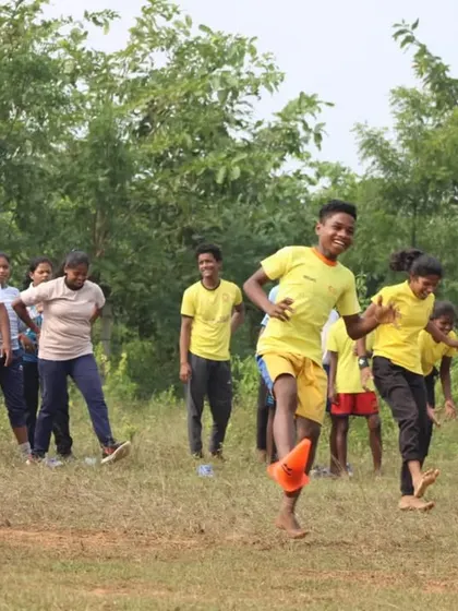 The joy of play on Children's Day. Our partner Mayurbhanj Foundation organized a day of recreational games, quizzes, and competitions to engage and inspire their young athletes.