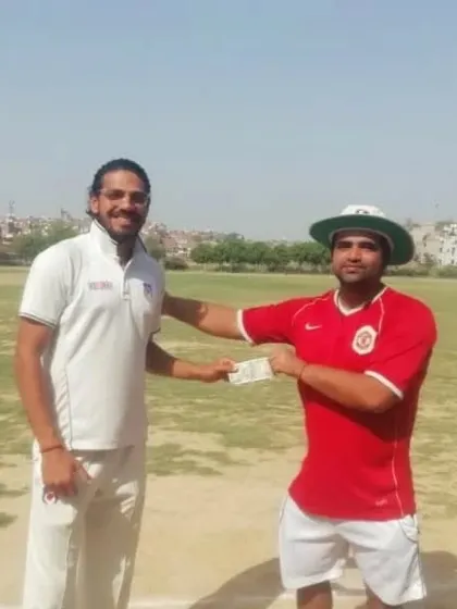Naman Singh Malik is awarded for his brilliant century, a knock of 120 runs in just 78 balls, during a DDCA League match against B.S.N.L.