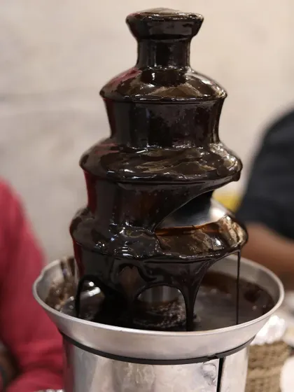A chocolate fountain is always a crowd-pleaser. It's a delicious and interactive dessert option that adds a touch of luxury and fun to any birthday party or event.