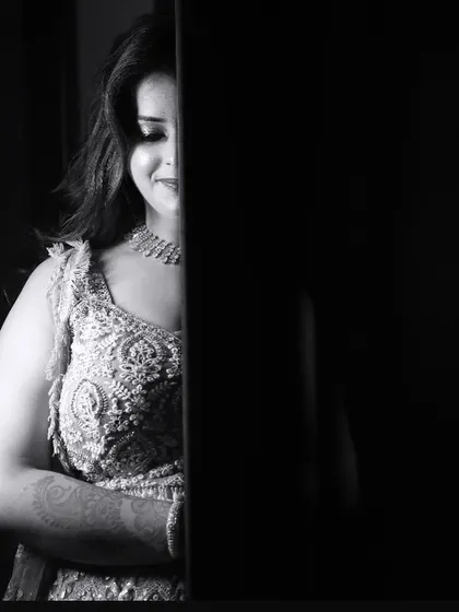 A dramatic black and white photo, creating a sense of mystery and elegance.