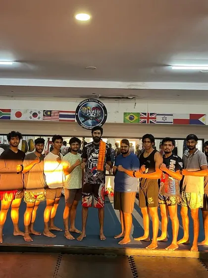 The whole team together, wishing one of our fighters luck for his MMA match. We are a family.