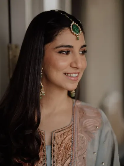 A treat for the eyes. This bride's sundowner mehendi look is soft, elegant, and perfectly complements her beautiful pastel blue outfit.