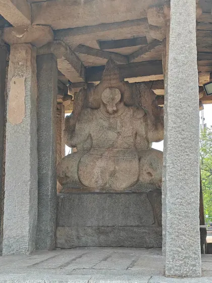 The monolithic Sasivekalu Ganapathi in Hampi. From the back, you can see the form of his mother Gowri, holding him on her lap.