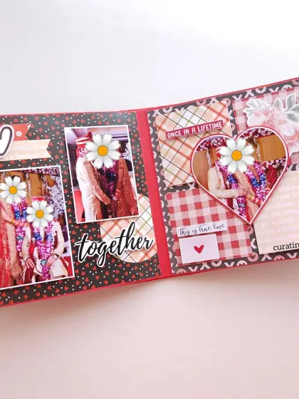 A heart-shaped photo frame and a space for a handwritten note make this page extra personal and romantic.