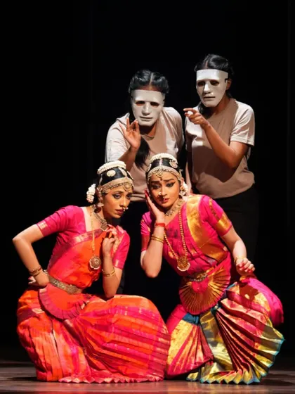 A scene depicting the interaction between the conscious and subconscious mind in "Tatsama Tadbhava." The masked figures represent the hidden parts of our psyche.