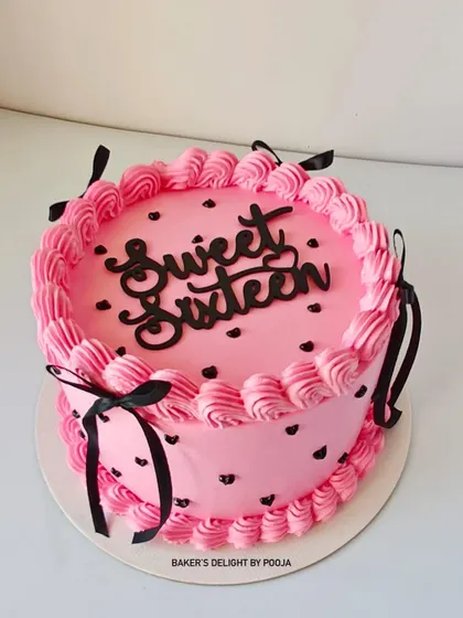A full view of the "Sweet Sixteen" cake. The pink and black design is chic and modern, perfect for a stylish teenager's milestone birthday.