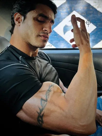 A final shot in the "guns and tattoos" series, showing that a strong physique is part of my everyday life.