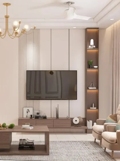 This living room is a study in modern comfort. We used a neutral color palette, a large sectional sofa, and built-in shelving with integrated lighting to create a space that is both stylish and highly functional.