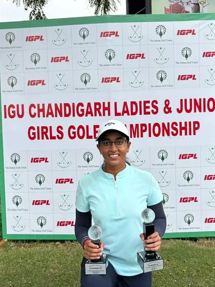 Riya Jadon smiles as she holds her two trophies from the IGU Chandigarh Ladies & Junior Girls Golf Championship. Her consistent play earned her T2nd in the combined category and 2nd in Category A.