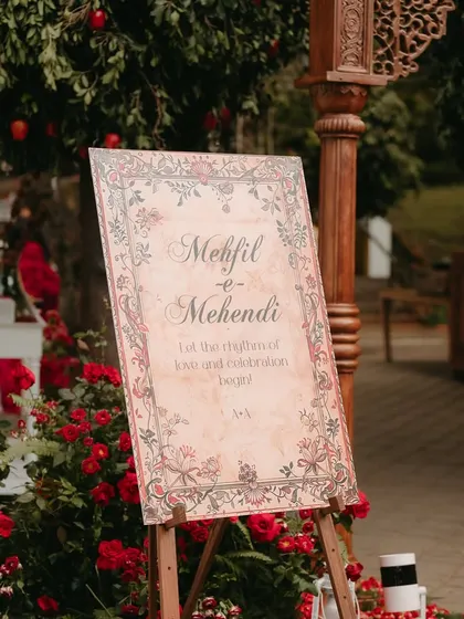 The welcome signage for the "Mehfil-e-Mehendi," featuring beautiful calligraphy and traditional motifs that set the tone for a soulful evening of celebration.