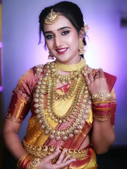 A beautiful portrait of a model in a complete Kerala bridal look, available for rent from my collection.