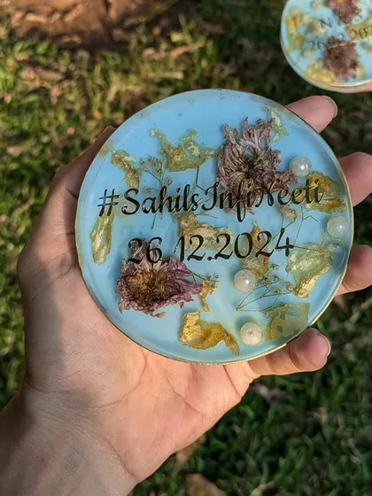 These custom coasters were made by preserving a couple's wedding flowers against a light blue background. Adding their wedding hashtag and date makes them a fun and personal keepsake.