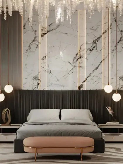 For this master bedroom, we aimed for pure luxury and comfort. The design features a dramatic floor-to-ceiling marble accent wall, a custom upholstered headboard, and elegant pendant lighting, creating a sophisticated and tranquil atmosphere.