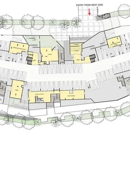 The stilt floor plan, detailing the parking layout, service areas, and the integration of landscape terraces at the ground level.